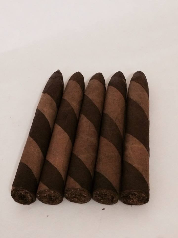 Undercover Farm Barberpole 93 rated Nicaraguan Cigars  These Nicaraguan Mild to Medium bodied premium Barber pole gauge cigars are aged 5 years all long filler Hand rolled in Nicaragua they have a subtle creamy, earthy flavor.  The Double wrapper changes the taste from mild to medium and is a very interesting smoke all the way down to the nub and of course it is all  premium cuban seed.Get them today in a bundle of 25  $99.99  As always all our Premium Bundles are guaranteed.     on Sale Till monday $47.99